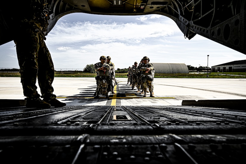 U.S. Army Soldiers assigned to the 404th Civil Affairs Battalion, board a CH-47 for an Airborne operation at Joint Base McGuire-Dix-Lakehurst, N.J. on Sept. 10, 2022. The unit conducted non-tactical airborne operations at the Army Aviation Facility in order to maintain mission readiness and proficiency among their paratroopers with the assistance of two CH-47’s out of Virginia.The Army Aviation Facility was created through a MILCON effort valued at 11.7 million dollars and made possible by the joint effort of ASA Fort Dix and the U.S. Marine Corps Marine Aircraft Group 49. The 2100 square foot building is host to an Army Ramp Management Area which provides a wide range of capabilities for both fixed and rotary wing aircraft such as the C-130, CH-47S, and UH-60S.