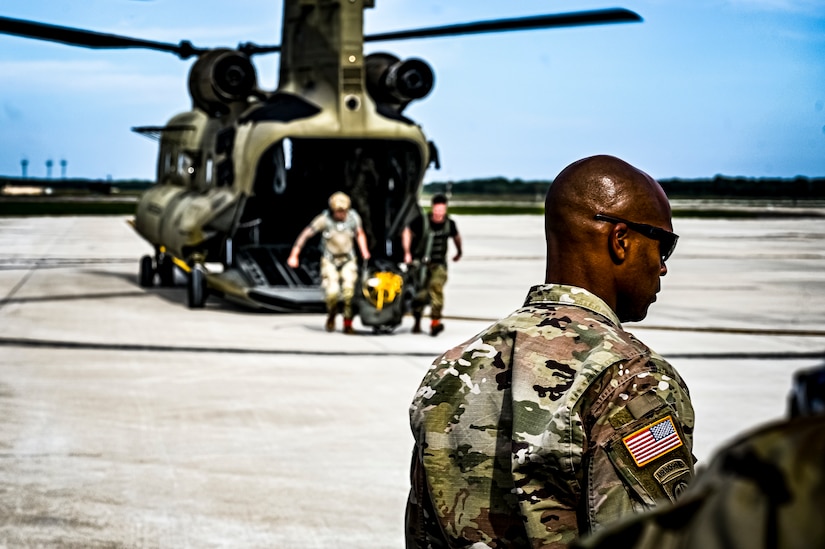 U.S. Army Soldiers assigned to the 404th Civil Affairs Battalion, board a CH-47 for an Airborne operation at Joint Base McGuire-Dix-Lakehurst, N.J. on Sept. 10, 2022. The unit conducted non-tactical airborne operations at the Army Aviation Facility in order to maintain mission readiness and proficiency among their paratroopers with the assistance of two CH-47’s out of Virginia.The Army Aviation Facility was created through a MILCON effort valued at 11.7 million dollars and made possible by the joint effort of ASA Fort Dix and the U.S. Marine Corps Marine Aircraft Group 49. The 2100 square foot building is host to an Army Ramp Management Area which provides a wide range of capabilities for both fixed and rotary wing aircraft such as the C-130, CH-47S, and UH-60S.