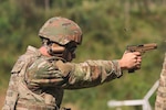 A vermont Army National Guard Soldier fire his M-17 during the individual pistol competition at the Vermont Adjutant General's 2022 Combat Marksmanship Competition held at the Ethan Allen Firing Range September 10-11, in Jericho Vermont.  (U.S. Army National Guard photo by Sgt. 1st Class Jason Alvarez)