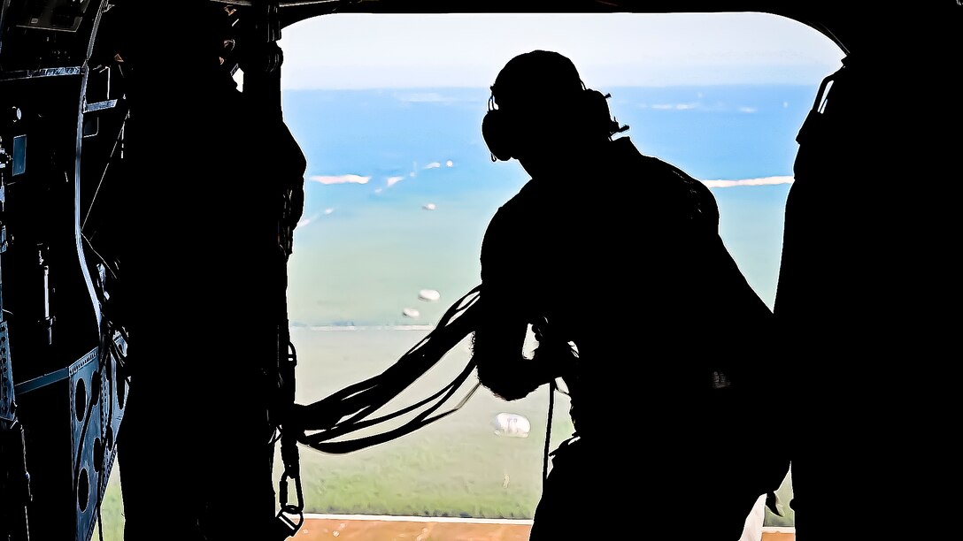 U.S. Army Soldiers assigned to the 404th Civil Affairs Battalion, jump from a CH-47 for an Airborne operation at Joint Base McGuire-Dix-Lakehurst, N.J. on Sept. 10, 2022. The unit conducted non-tactical airborne operations at the Army Aviation Facility in order to maintain mission readiness and proficiency among their paratroopers with the assistance of two CH-47’s out of Virginia.The Army Aviation Facility was created through a MILCON effort valued at 11.7 million dollars and made possible by the joint effort of ASA Fort Dix and the U.S. Marine Corps Marine Aircraft Group 49. The 2100 square foot building is host to an Army Ramp Management Area which provides a wide range of capabilities for both fixed and rotary wing aircraft such as the C-130, CH-47S, and UH-60S.