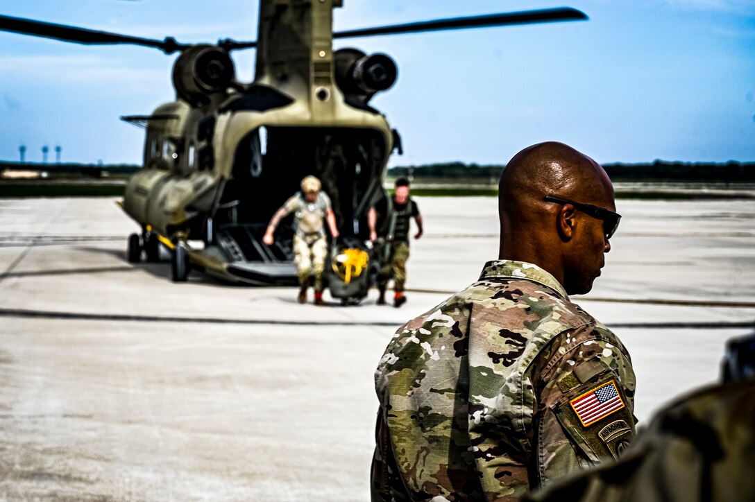 U.S. Army Soldiers assigned to the 404th Civil Affairs Battalion, board a CH-47 for an Airborne operation at Joint Base McGuire-Dix-Lakehurst, N.J. on Sept. 10, 2022. The unit conducted non-tactical airborne operations at the Army Aviation Facility in order to maintain mission readiness and proficiency among their paratroopers with the assistance of two CH-47’s out of Virginia.The Army Aviation Facility was created through a MILCON effort valued at 11.7 million dollars and made possible by the joint effort of ASA Fort Dix and the U.S. Marine Corps Marine Aircraft Group 49. The 2100 square foot building is host to an Army Ramp Management Area which provides a wide range of capabilities for both fixed and rotary wing aircraft such as the C-130, CH-47S, and UH-60S.