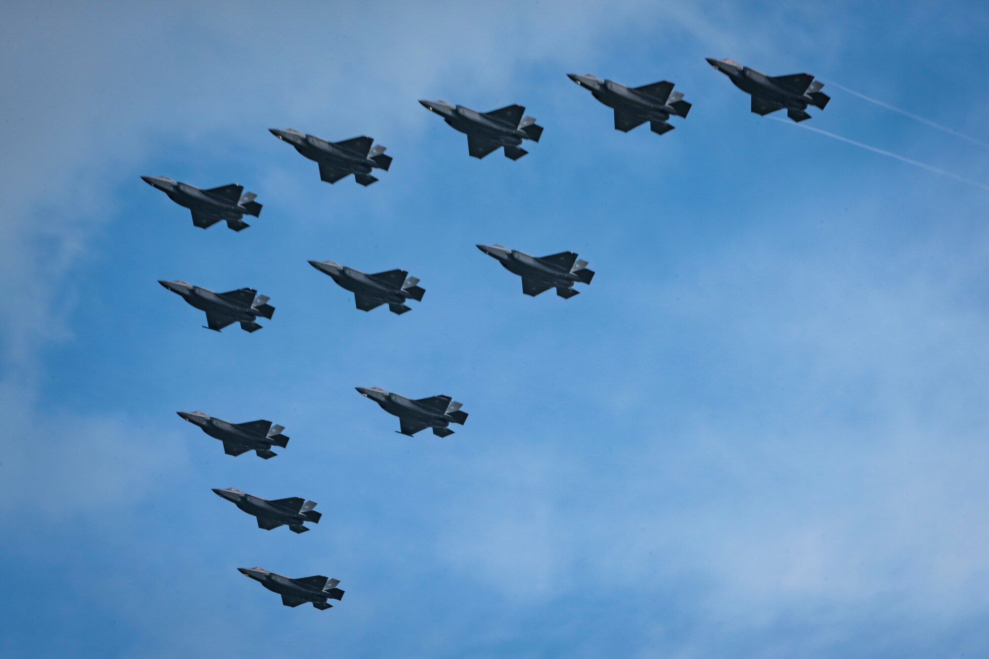 Japanese military aircraft flying overhead.