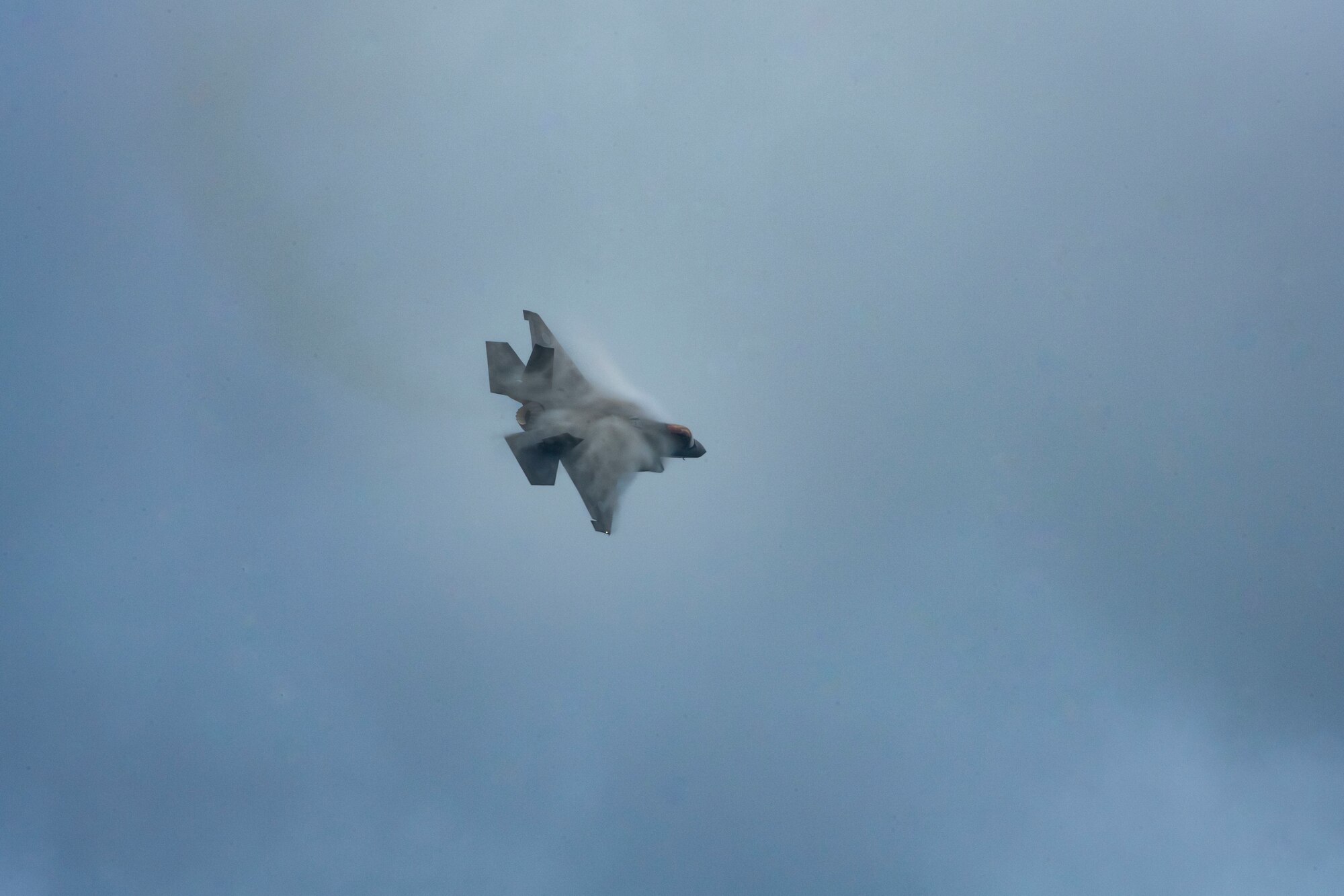 U.S. and Japanese military aircraft are displayed to attendees during an air show.