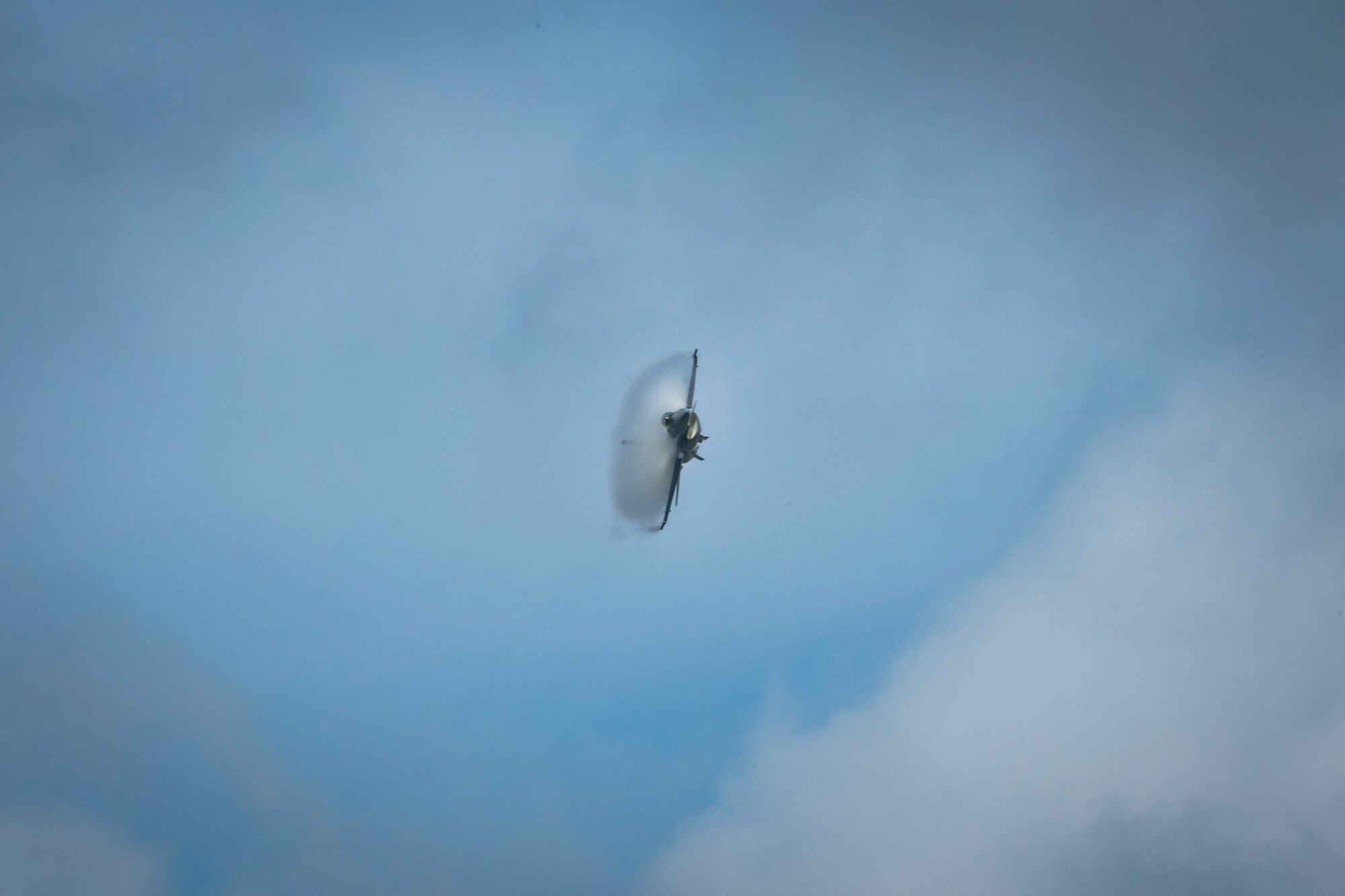 U.S. and Japanese military aircraft are displayed to attendees during an air show.