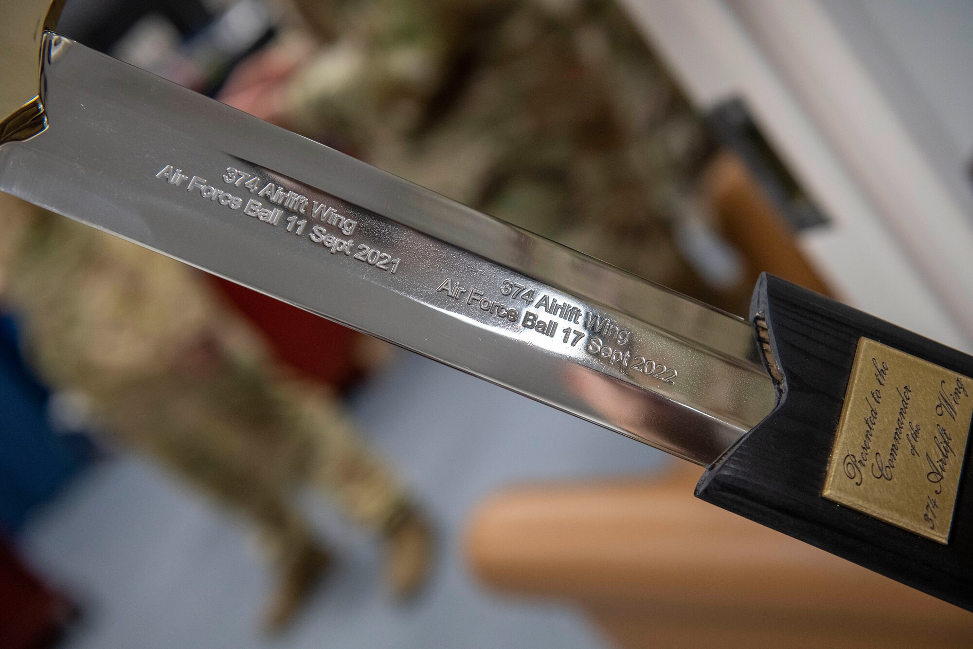Engravings shine off of a newly presented Wing Ceremonial sword