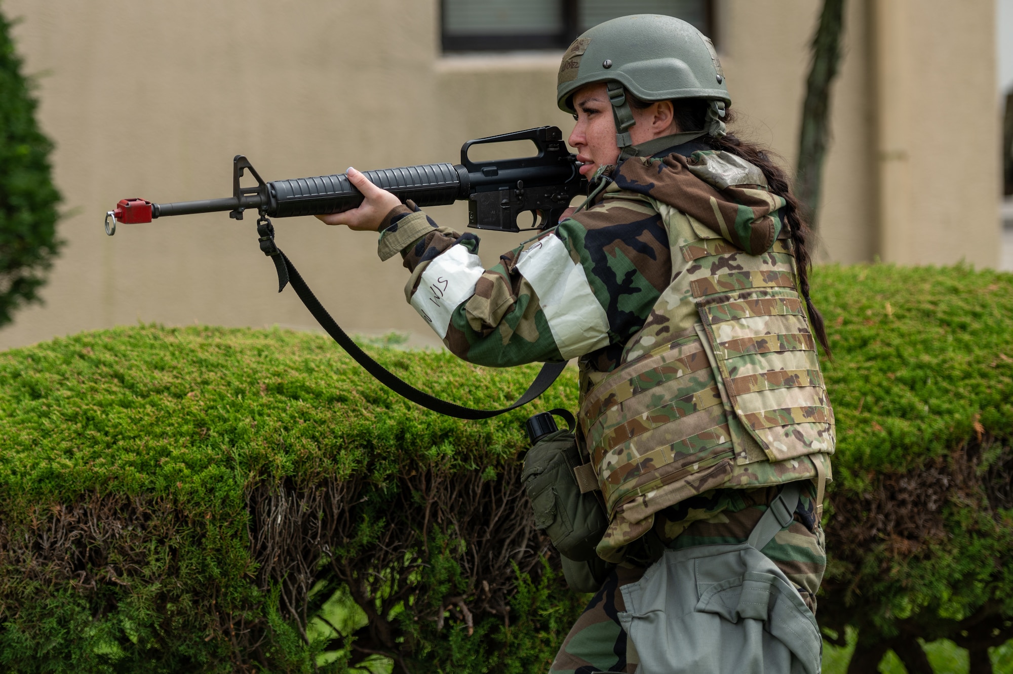 U.S. Air Force Airman 1st Class Celestine Gonzales, 51st Force Support Squadron shelter management team member, performs a post-attack reconnaissance (PAR) sweep during a base-wide training event