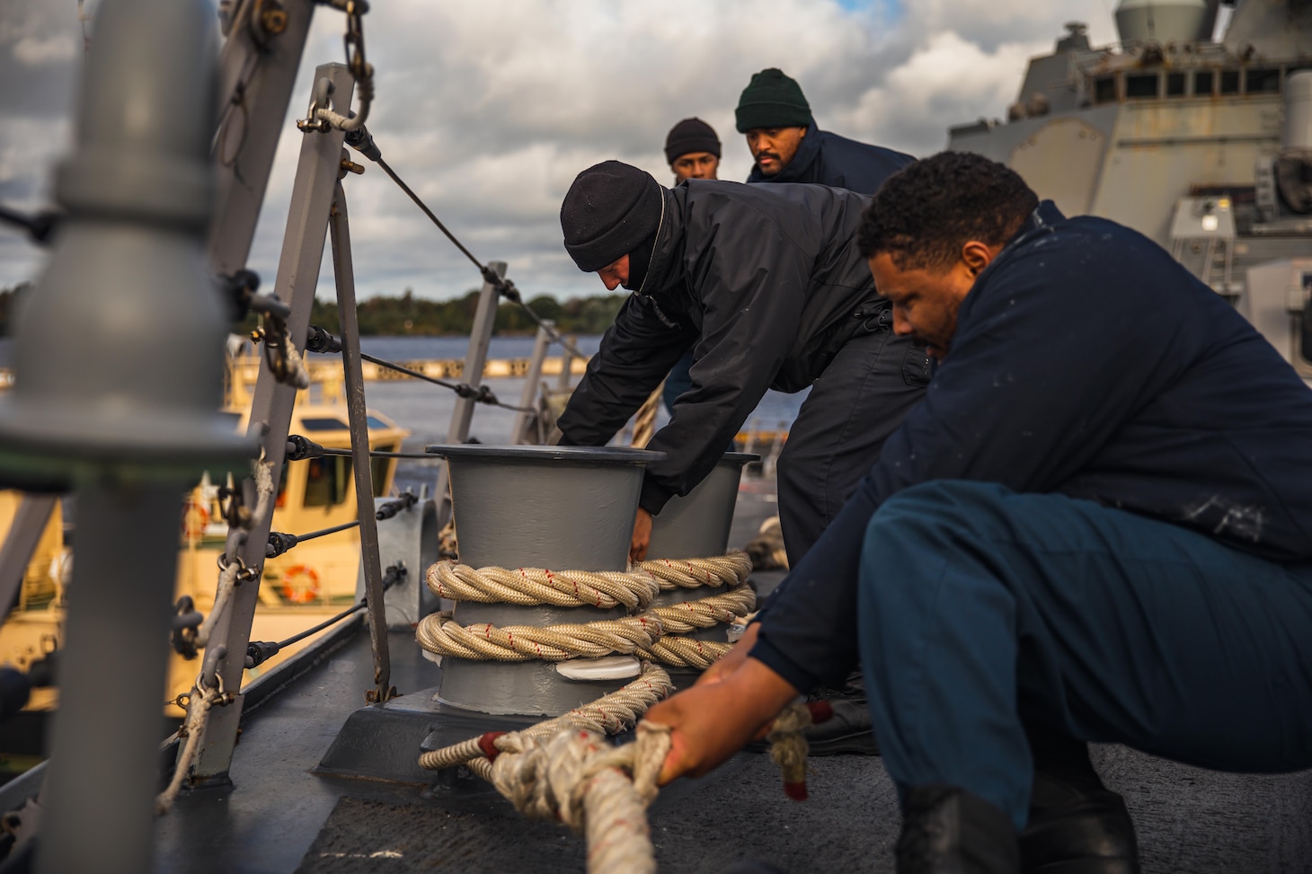 (Sept. 15, 2022) U.S. Navy Sailors assigned to the Arleigh Burke-class guided-missile destroyer USS Paul Ignatius (DDG 117) single up a line during sea and anchor detail as the ship arrives in Riga, Latvia for a scheduled port visit, Sept. 15, 2022. Paul Ignatius is part of the Kearsarge Amphibious Ready Group and embarked 22nd Marine Expeditionary Unit, under the command and control of Task Force 61/2, on a scheduled deployment in the U.S. Naval Forces Europe area of operations, employed by U.S. Sixth Fleet to defend U.S., allied and partner interests. (U.S. Navy photo by Mass Communication Specialist 2nd Class Aaron Lau)