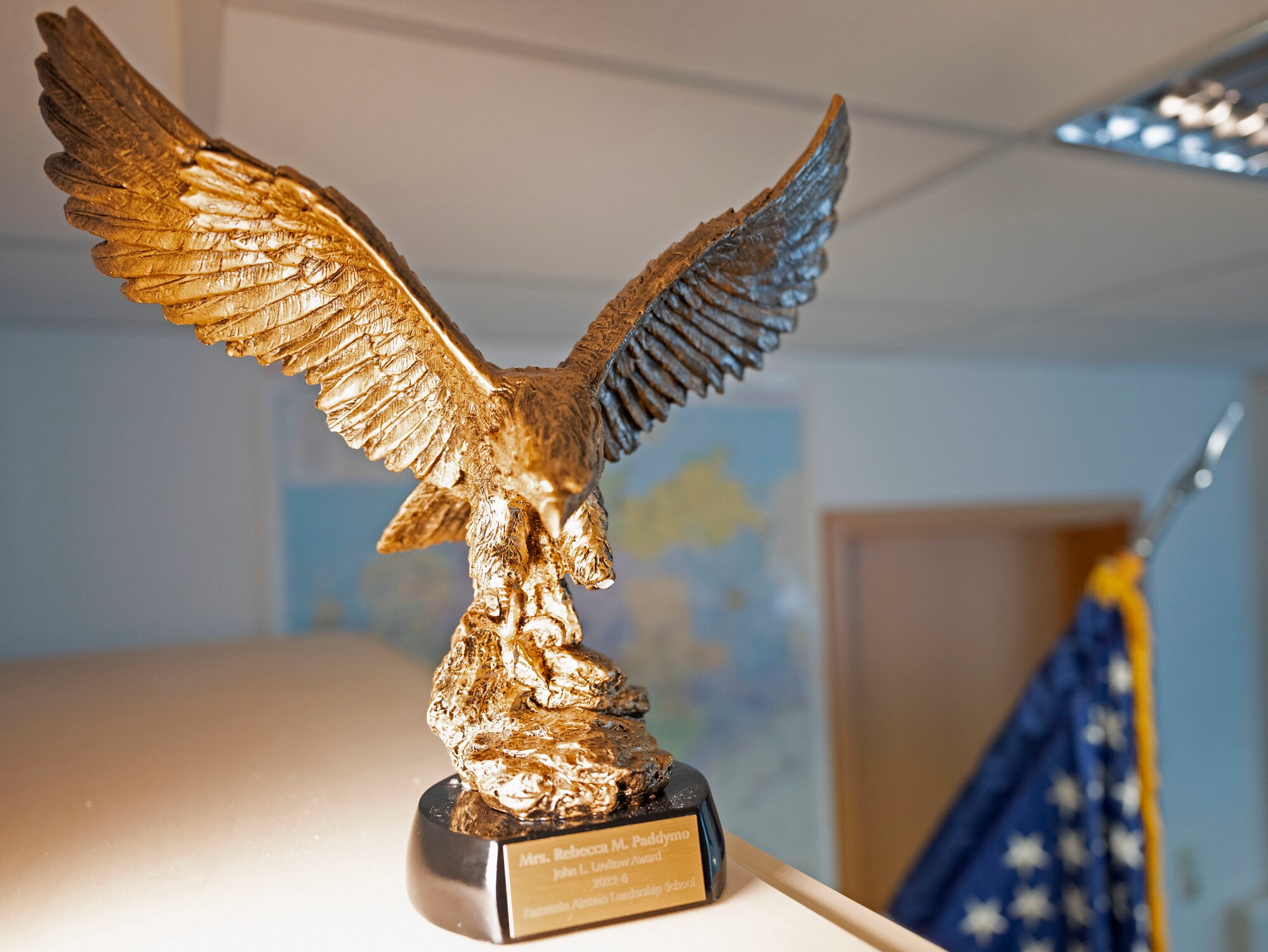 A John L. Levitow award, earned by Rebecca Paddymo, 569th U.S. Forces Police Squadron program coordinator, is displayed at Vogelweh Military Complex, Germany, Sept. 13, 2022. Paddymo was chosen for the award by her Airman Leadership School peers and her academic scores. She is the first civilian to earn the award at ramstein.(U.S. Air Force photo by Senior Airman Thomas Karol)