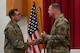 Chaplain Lt. Col. Dallas Little is anointed as Wing Chaplain by Col. Dan Hoadley, 5th Bomb Wing commander, and Global Strike Command Chaplain Col. David Kelley, at Minot Air Force Base, North Dakota, Sept. 13, 2022. The ceremony was the first ever conducted at Minot AFB and one of few ever Air Force wide. (U.S Air Force photo by Senior Airman Zachary Wright)