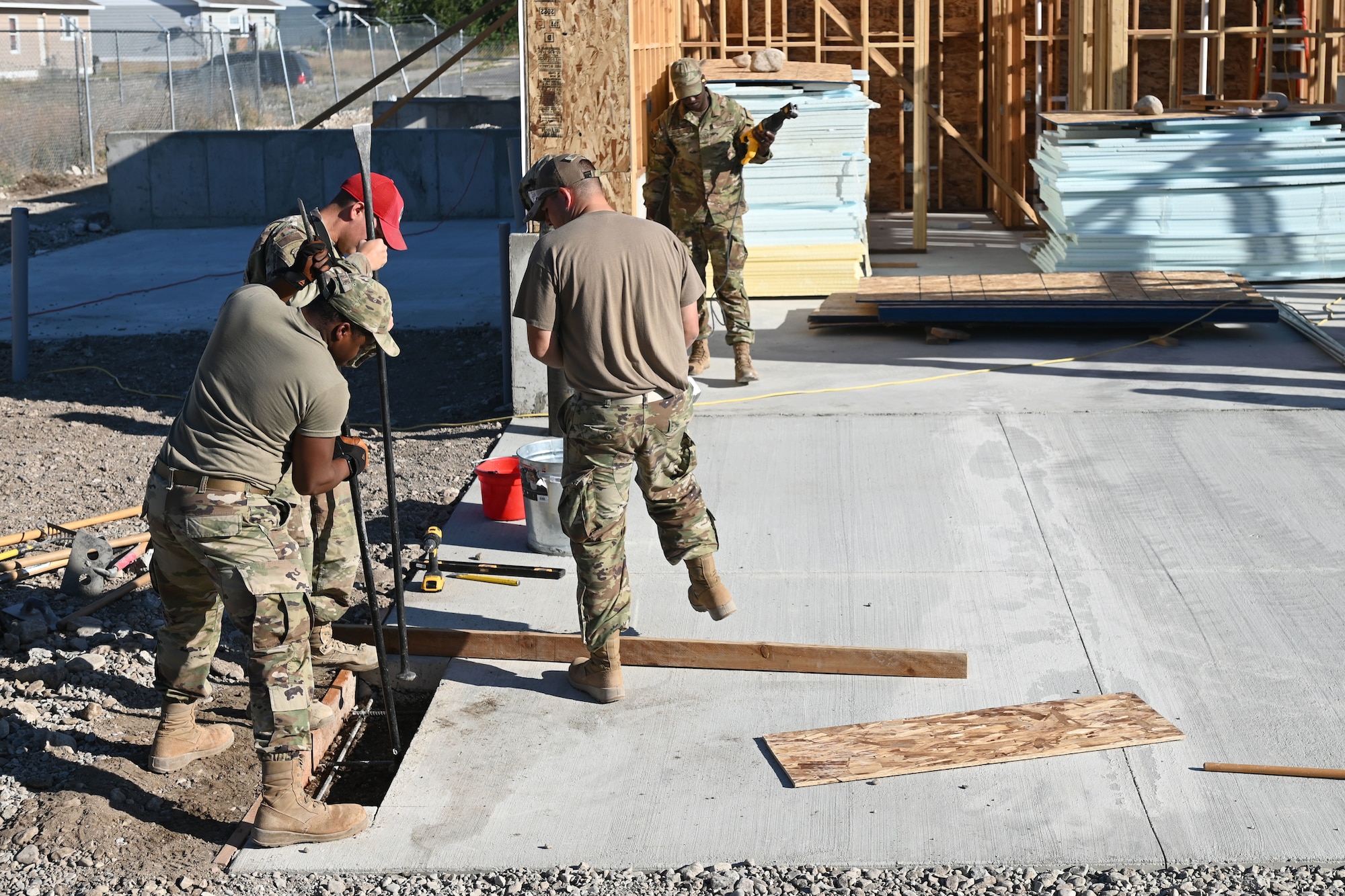 U.S. Air Force Airmen assigned to the 169th Civil Engineer Squadron from the South Carolina Air National Guard and the 219th Red Horse Squadron from the Montana Air National Guard make concrete repairs during construction of a community center for the Blackfeet Nation Native Americans at Heart Butte, Montana, September 6, 2022. This temporary deployment is part of the 169th Civil Engineer Squadron’s yearly Innovative Readiness Training (IRT) that helps Airmen train in a real-world environment to acquire and maintain their trade skills. (U.S. Air National Guard photo by Airman 1st Class Amy Rangel, 169th Fighter Wing Public Affairs)