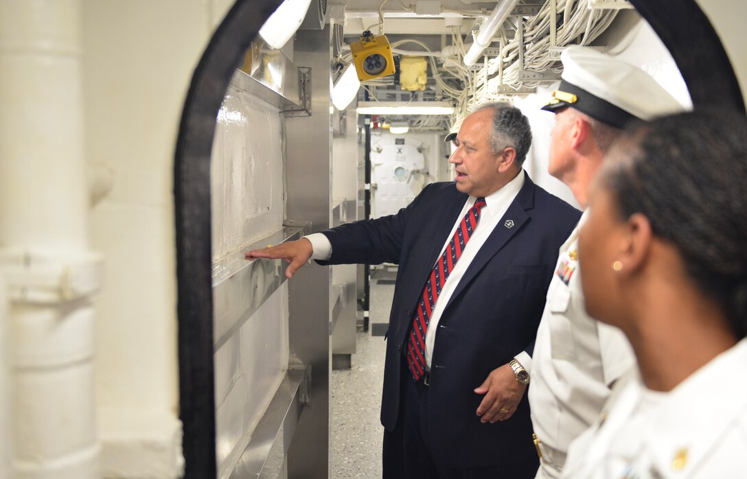 RIO DE JANEIRO (Sept. 8, 2022) U.S. Secretary of the Navy Carlos Del Toro talks with U.S. Navy Cmdr. Christopher Turmel, commanding officer of the Arleigh Burke-class guided-missile destroyer USS Lassen (DDG 82), aboard the ship during a visit as part of UNITAS LXIII Sept. 8, 2022.  UNITAS is the world’s longest-running maritime exercise. Hosted this year by Brazil, it brings together multinational forces from Brazil, Cameroon, Chile, Colombia, Dominican Republic, Ecuador, France, Guyana, Jamaica, Mexico, Namibia, Panama, Paraguay, Peru, South Korea, Spain, United Kingdom, Uruguay, and the United States conducting operations in and off the coast of Rio de Janeiro. The exercise trains forces to conduct joint maritime operations through the execution of anti-surface, anti-submarine, anti-air, amphibious and electronic warfare operations that enhance warfighting proficiency and increase interoperability among participating naval and marine forces. (U.S. Navy photo by Mass Communication Specialist 1st Class Mitch Meppelink/Released)