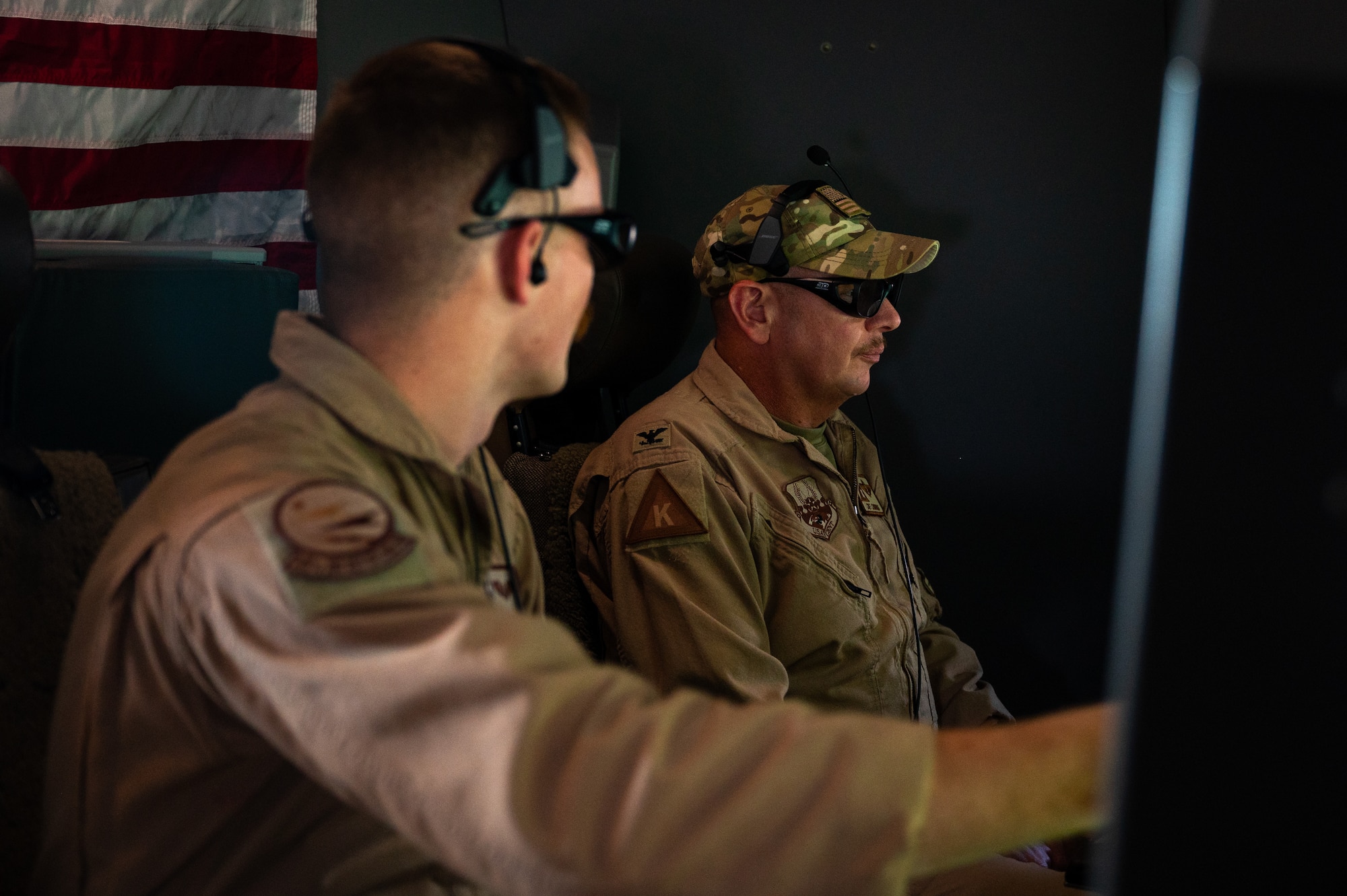 U.S. Air Force Senior Airman Tanner Todd, 349th Air Refueling Squadron boom operator, demonstrates the KC-46A Pegasus’ boom station procedures to U.S. Air Force Col. Dennis Cummings, 379th Air Expeditionary Wing deputy commander, Sept. 3, 2022, in the U.S. Central Command area of responsibility