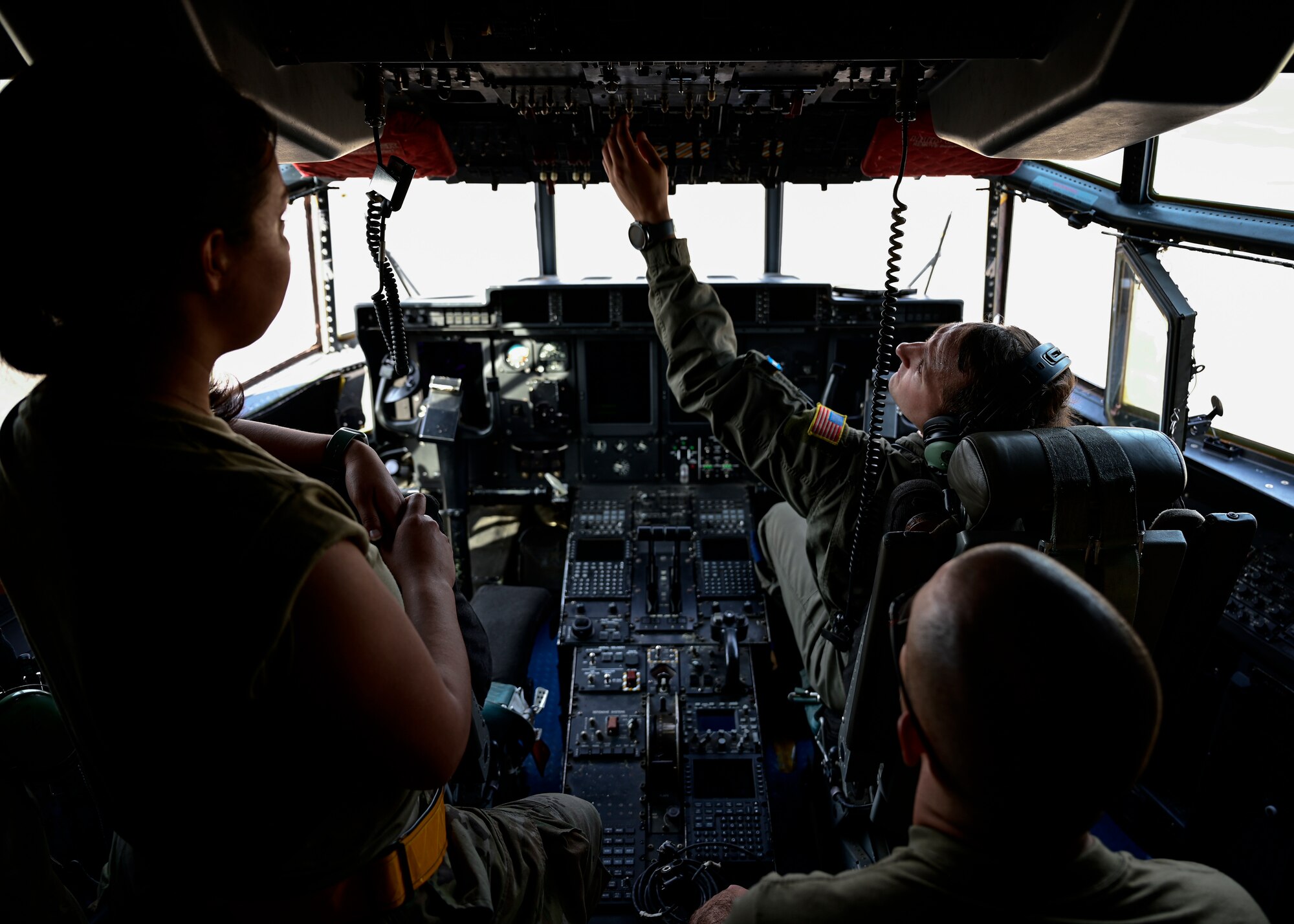 A man performs a pre-flight check.