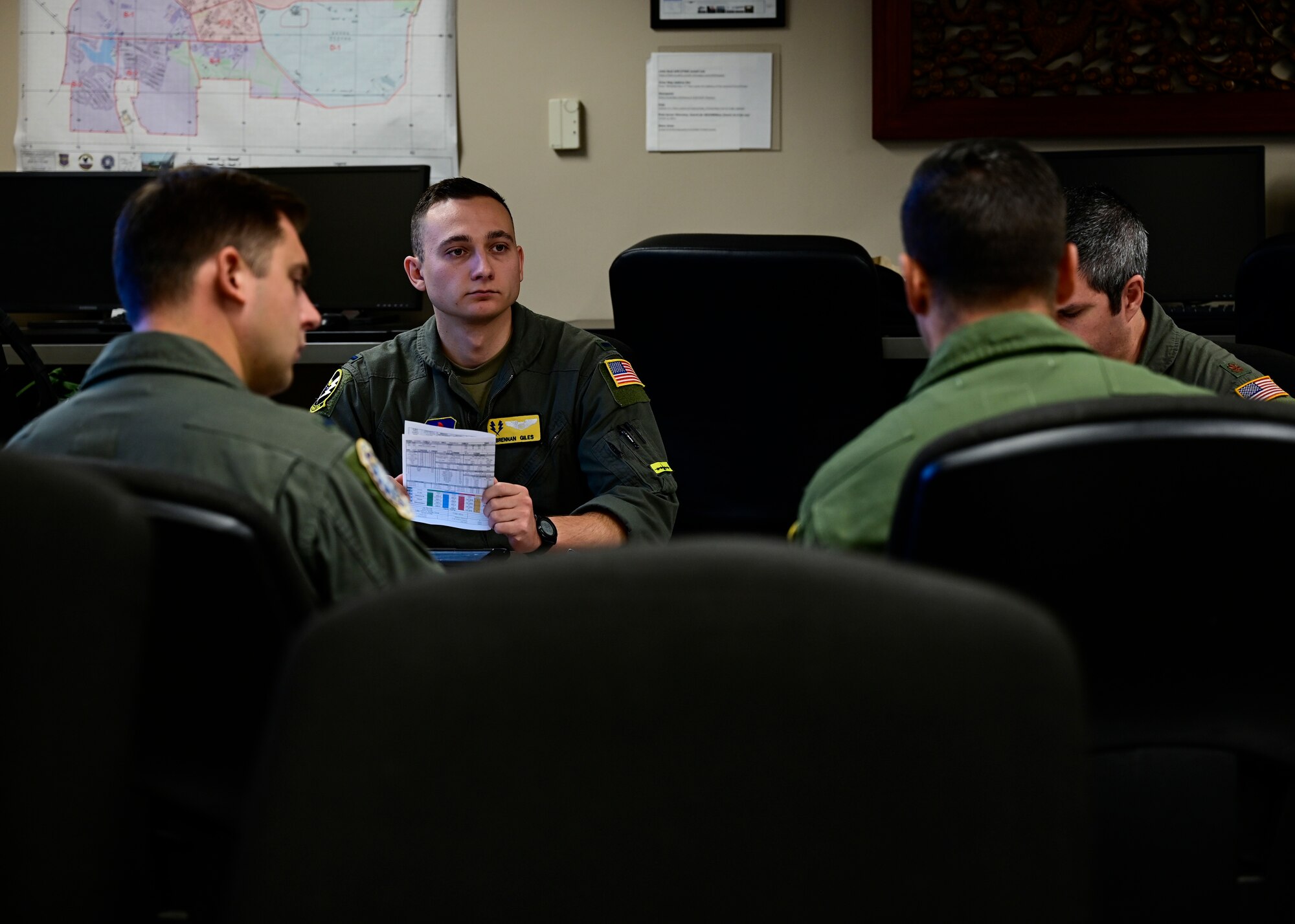 man takes part of preflight briefing