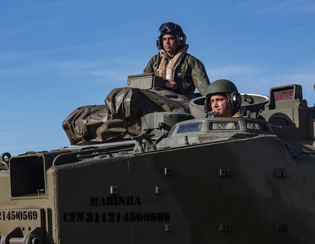 Brazilian Marines wade ashore in an AAVP-7A1 (Amphibious Assault Vehicle) during UNITAS LXIII in Ilha do Governador, Rio de Janeiro during exercise UNITAS LXIII, Sept. 6, 2022. UNITAS is the world’s longest-running annual multinational maritime exercise that focuses on enhancing interoperability among multiple nations and joint forces during littoral and amphibious operations in order to build on existing regional partnerships and create new enduring relationships that promote peace, stability, and prosperity in the U.S. Southern Command’s area of responsibility. (U.S. Marine Corps photo by Lance Cpl. Trystan Taft)