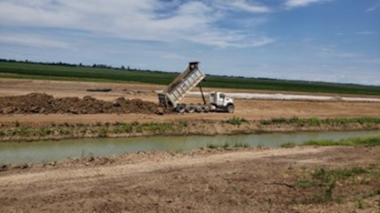 This much-needed project reduced seepage along the St. Francis River levee. Seepage remediation berms help prevent water from passing under levees, which can later lead to sand boils and threaten the overall integrity of the flood protection system.

The Corps partnered with the Mud Slough Drainage District No. 1 to complete the $2,666,362 seepage remediation project in the vicinity of U.S. Highway 412, along the St. Francis River levee.

To complete the project, contractor SYTE Corporation constructed approximately 3,500 feet of seepage berms by placing 100,562 cubic yards of compacted fill in the seepage berm.