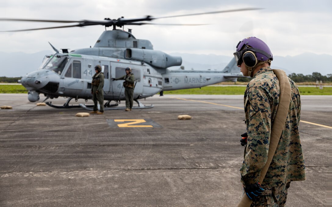 U.S. Marines with Marine Light Attack Helicopter Squadron (HMLA) 773, 4th Marine Aircraft Wing, Marine Forces Reserve, in support of Special Purpose Marine Air-Ground Task Force UNITAS LXIII, conduct a forward arming and refueling point operation in support of exercise UNITAS LXIII at Santa Cruz Air Force Base, Rio de Janeiro, Sept. 5, 2022. UNITAS develops and sustains relationships that improve the capacity of our reemerging and enduring maritime partners to achieve common objectives. Additionally, the military-to-military exchanges foster friendly, mutual cooperation and understanding among participating navies and marine Corps. (U.S. Marine Corps photo by Cpl. Jonathan L. Gonzalez)