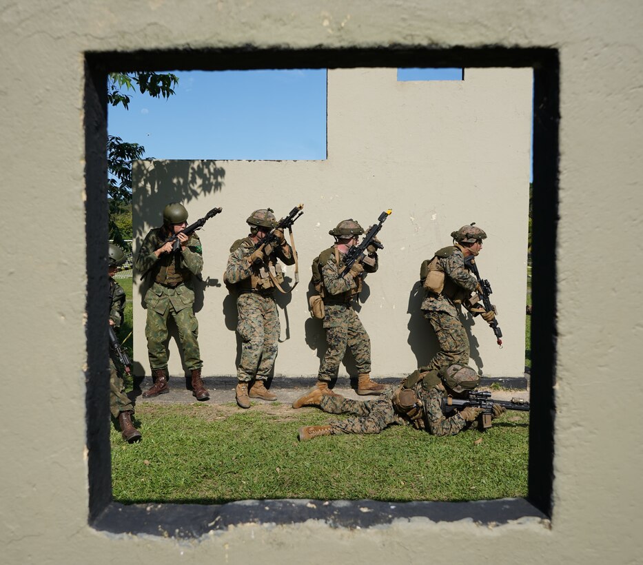 Marines from Lima Company, 3rd Battalion, 25th Marine Regiment, 4th Marine Division, Marine Forces Reserve in support of Special Purpose Marine Air-Ground Task Force UNITAS LXIII, conduct Military Operations in Urban Terrain (MOUT) training with Brazilian Marines at Ilha do Governador, Rio de Janeiro, Sept. 7, 2022. The training phase of exercise UNITAS integrates partner nations in various military events to exchange information on best practices and enhance interoperability of the multinational force. UNITAS is the world’s longest-running annual multinational maritime exercise that focuses on enhancing interoperability among multiple nations and joint forces during littoral and amphibious operations in order to build on existing regional partnerships and create new enduring relationships that promote peace, stability, and prosperity in the U.S. Southern Command’s area of responsibility. (U.S. Marine Corps photo by Maj. Jeremy Wheeler)