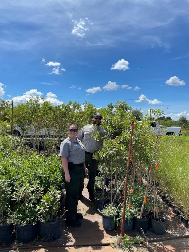 Natural Resource Specialists Rob Hill and Megan Myer choose trees for the National Public Lands Day tree planting and reforestation event at W.P. Franklin Lock.