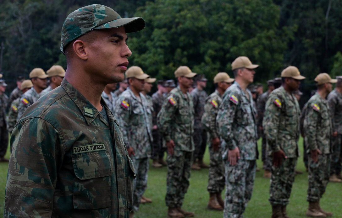 Service members from Brazil, Dominican Republic, Ecuador, Jamaica, Paraguay, and the United States of America, stand in formation for a commencement ceremony as part of exercise UNITAS LXIII in Ilha do Governador, Rio de Janeiro, Sept. 5, 2022. UNITAS is the world’s longest-running annual multinational maritime exercise that focuses on enhancing interoperability among multiple nations and joint forces during littoral and amphibious operations in order to build on existing regional partnerships and create new enduring relationships that promote peace, stability and prosperity in the U.S. Southern Command’s area of responsibility. (U.S. Marine Corps photo by Lance Cpl. Trystan Taft)