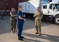 U.S. Army Maj. Darren Hamby, right, Joint Task Force Civil Support Incident Support Team 1 Officer-in-Charge, describes the team’s ability to rapidly deploy in response to a catastrophic manmade or natural disaster to North American Aerospace Defense Command and U.S. Northern Command Deputy Operations Officer and Exercise Director, Coast Guard Rear Adm. Sean Regan, during his visit to JTF-CS headquarters on Ft. Eustis, Virginia, Sept. 14, 2022.
