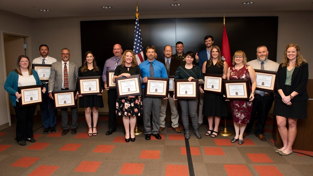 The U.S. Army Corps of Engineers Nashville District 2022 Leadership Development Program Level II Course graduates and support staff poses with Lt. Col. Joseph Sahl, Nashville District commander, and Michael Evans, course instructor, during a graduation ceremony Sept. 14, 2022, at the district headquarters in Nashville, Tennessee. (USACE Photo by Lee Roberts)