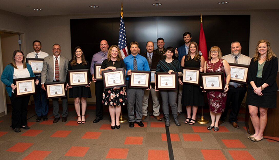 The U.S. Army Corps of Engineers Nashville District 2022 Leadership Development Program Level II Course graduates and support staff poses with Lt. Col. Joseph Sahl, Nashville District commander, and Michael Evans, course instructor, during a graduation ceremony Sept. 14, 2022, at the district headquarters in Nashville, Tennessee. (USACE Photo by Lee Roberts)