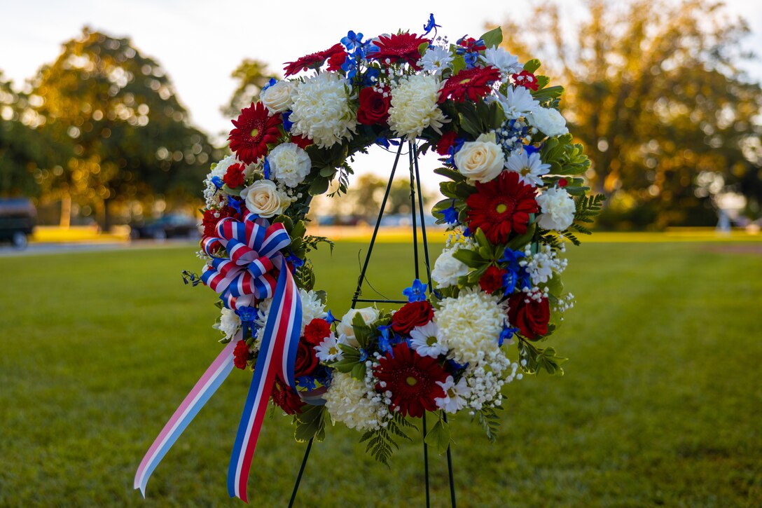 U.S. Marines and Sailors from 2d Marine Division participate in a wreath-laying ceremony on Camp Lejeune, North Carolina, Sept. 9, 2022. This ceremony is a tribute to those who made the ultimate sacrifice and in remembrance of the events on Sept. 11, 2001. (U.S. Marine Corps photo by Lance Cpl. Deja Thomas)