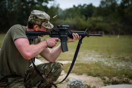 U.S. Air Force Airman 1st Class Gabriel Fortier, a knowledge operations technician with the 260th Air Traffic Control Squadron, New Hampshire Air National Guard, fires a rifle during a weapons qualification course at Fort Devens, Mass., Sept. 11, 2022. The 260th participated in two days of firearms training to increase mobility readiness.