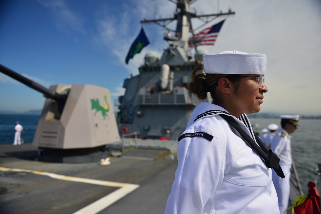 GUANABARA BAY, Brazil (Sept. 7, 2022) Operations Specialist 3rd Class Sheylla Pineda mans the rails aboard the Arleigh Burke-class guided-missile destroyer USS Lassen (DDG 82) during the Parade of Ships marking Brazil’s bicentennial during UNITAS LXIII, Sept. 7, 2022. UNITAS is the world’s longest-running maritime exercise. Hosted this year by Brazil, it brings together multinational forces from Belize, Brazil, Cameroon, Chile, Colombia, Dominican Republic, Ecuador, France, Guyana, Jamaica, Mexico, Namibia, Panama, Paraguay, Peru, South Korea, Spain, United Kingdom, Uruguay, and the United States conducting operations in and off the coast of Rio de Janeiro. The exercise trains forces to conduct joint maritime operations through the execution of anti-surface, anti-submarine, anti-air, amphibious and electronic warfare operations that enhance warfighting proficiency and increase interoperability among participating naval and marine forces. (U.S. Navy photo by Mass Communication Specialist 1st Class Mitch Meppelink/Released)