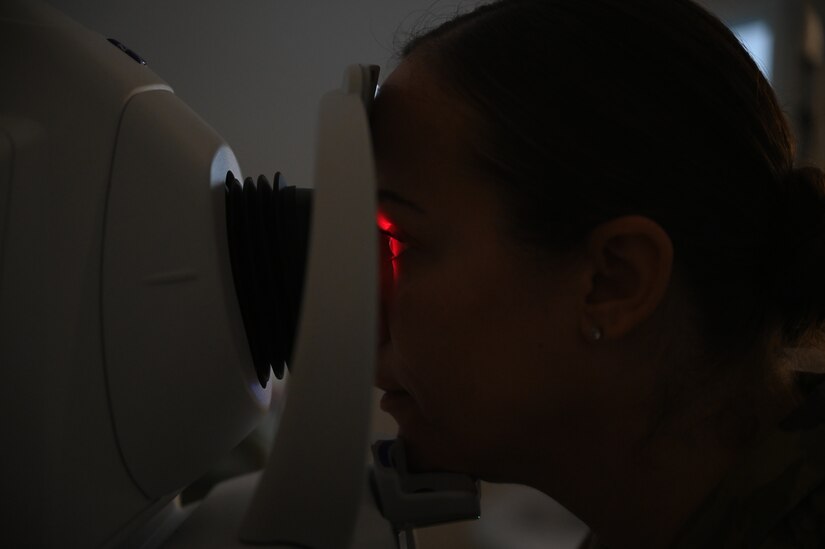 A patient receiving an eye exam.