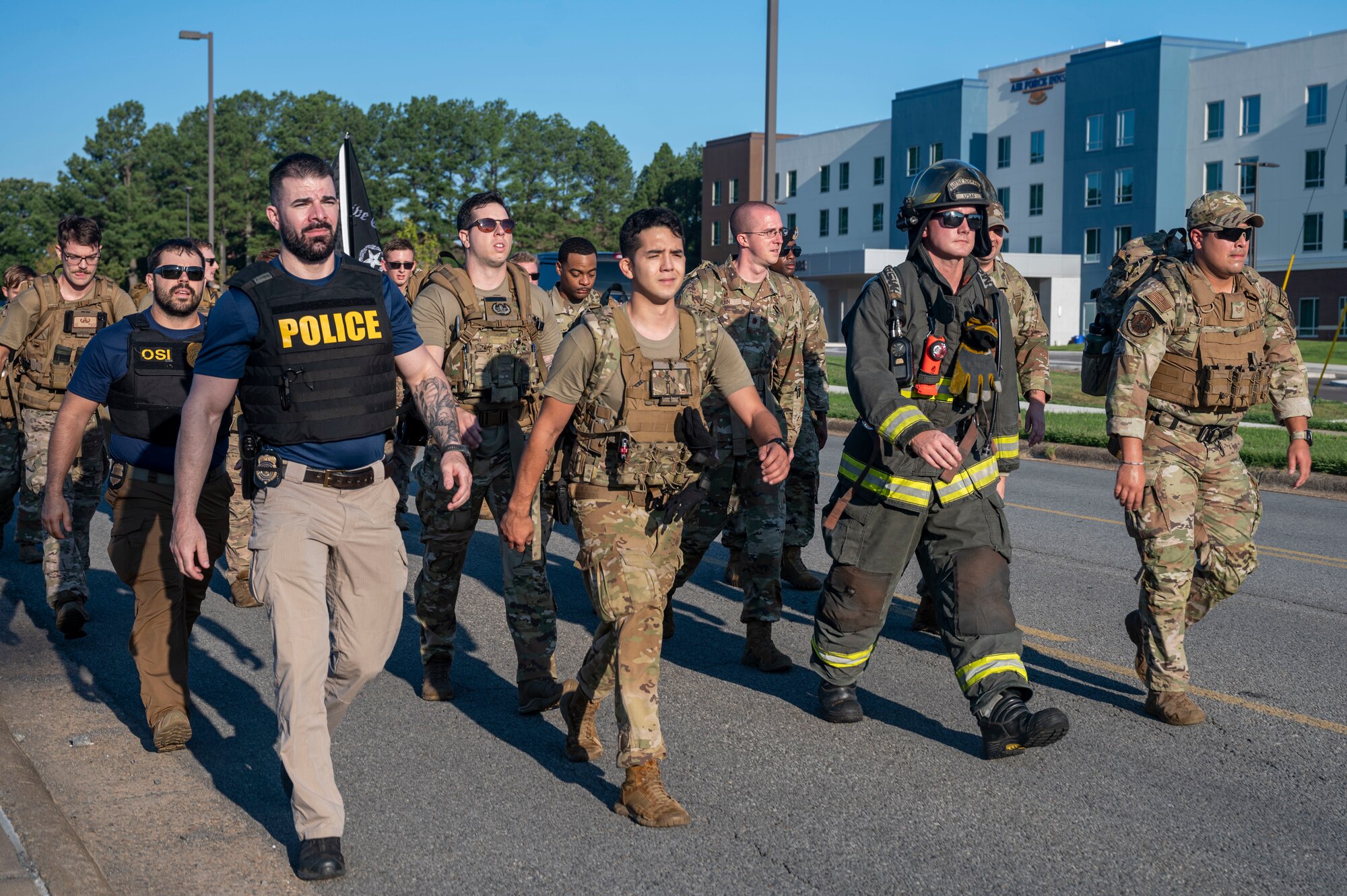Men in uniform march