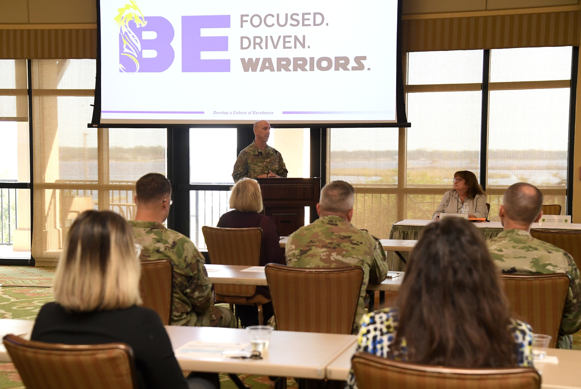 U.S. Air Force Col. William Hunter, 81st Training Wing commander, delivers a brief during the Industry Day Exchange Proposed Mixed-Use Enhanced Use Lease meeting inside the Bay Breeze Event Center at Keesler Air Force Base, Mississippi, Sept. 15, 2022. The Air Force Civil Engineer Center and 81st Training Wing hosted the event to explore the possibility of a Cyber Processing Center opportunity at Keesler. (U.S. Air Force photo by Kemberly Groue)