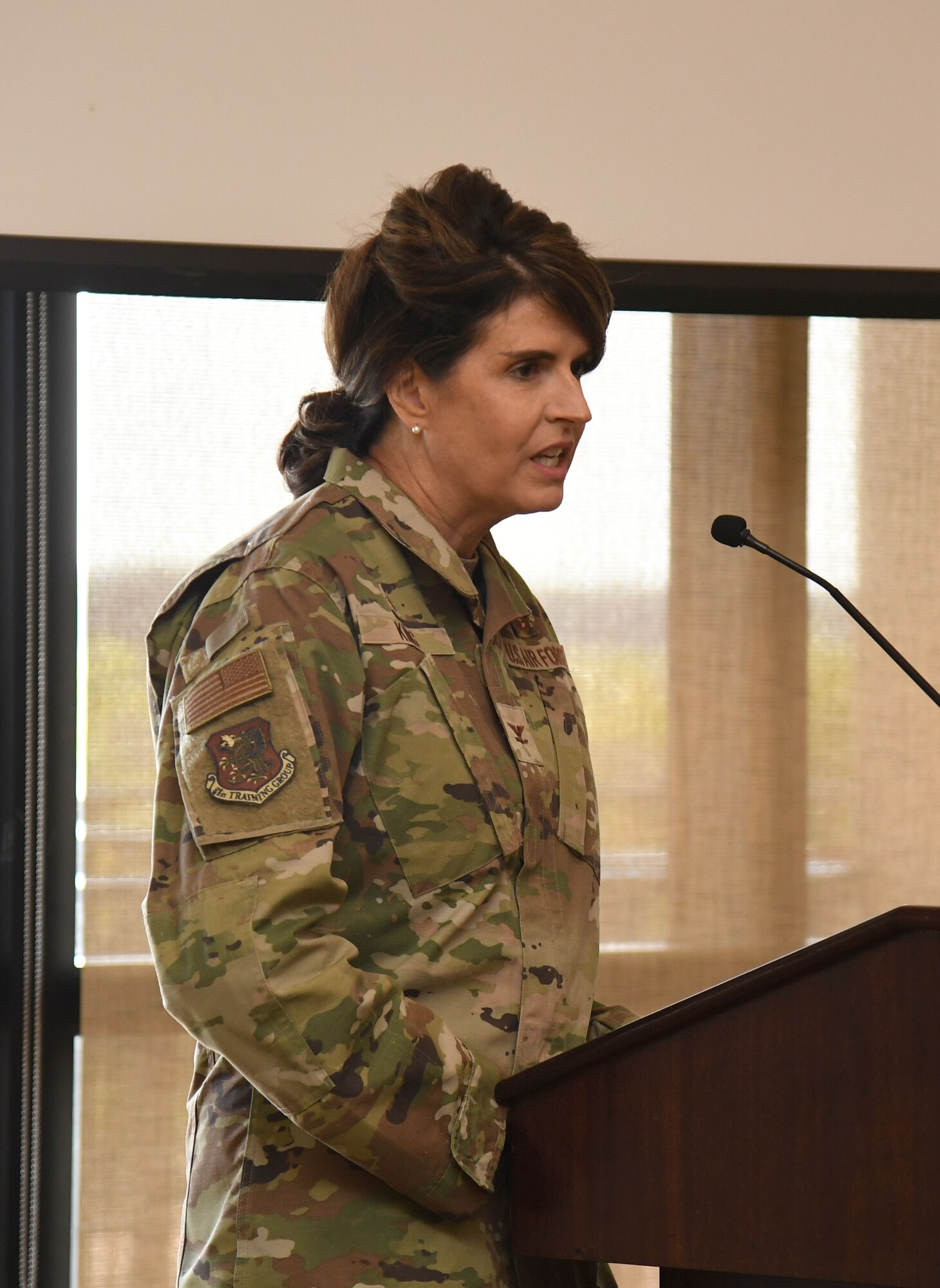 U.S. Air Force Col. Laura King, 81st Training Group commander, delivers a brief during the Industry Day Exchange Proposed Mixed-Use Enhanced Use Lease meeting inside the Bay Breeze Event Center at Keesler Air Force Base, Mississippi, Sept. 15, 2022. The Air Force Civil Engineer Center and 81st Training Wing hosted the event to explore the possibility of a Cyber Processing Center opportunity at Keesler. (U.S. Air Force photo by Kemberly Groue)
