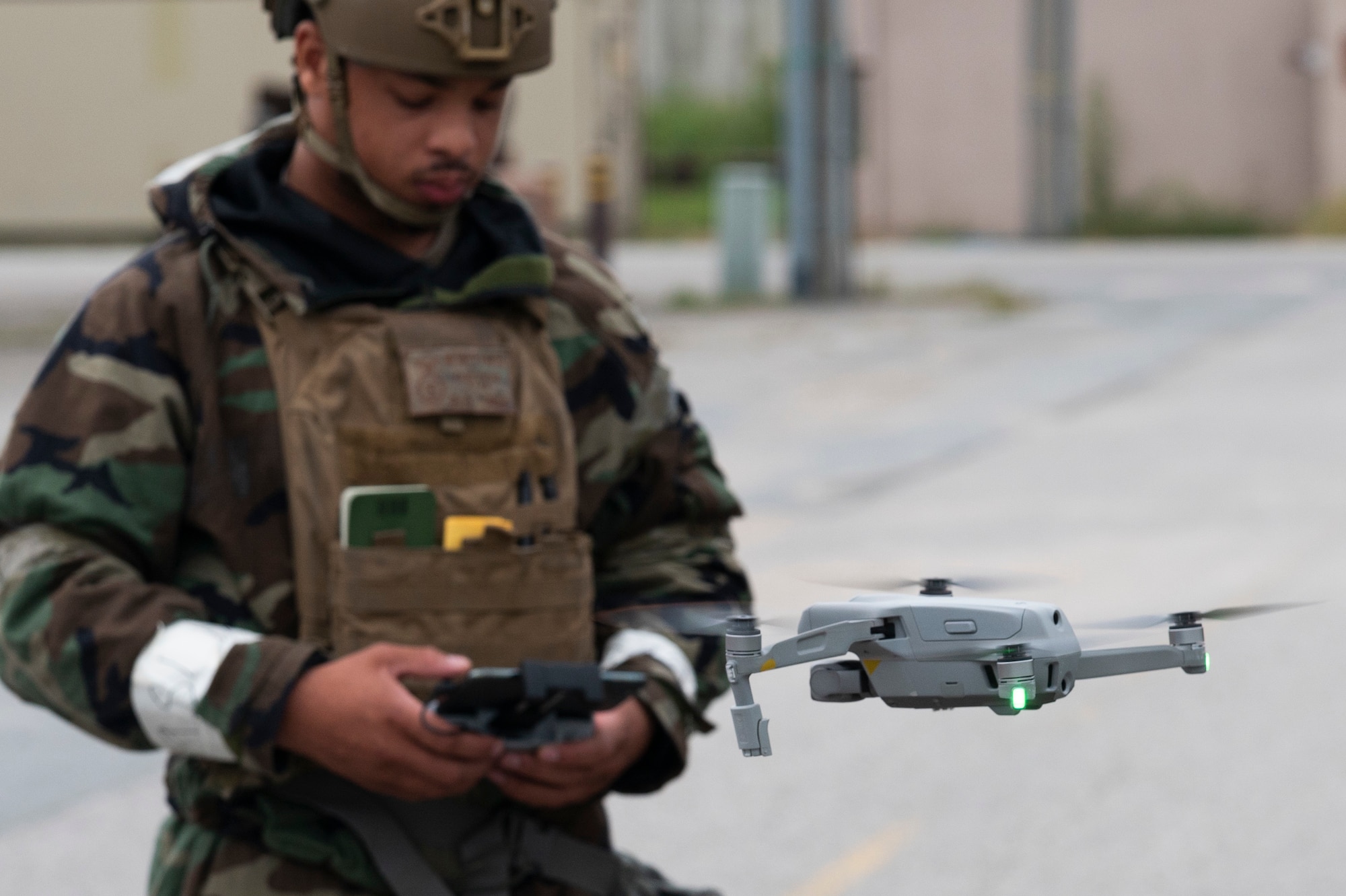 U.S. Air Force Senior Airman Austin Geter, opposing forces (OPPFOR) member, operates a drone during a training event
