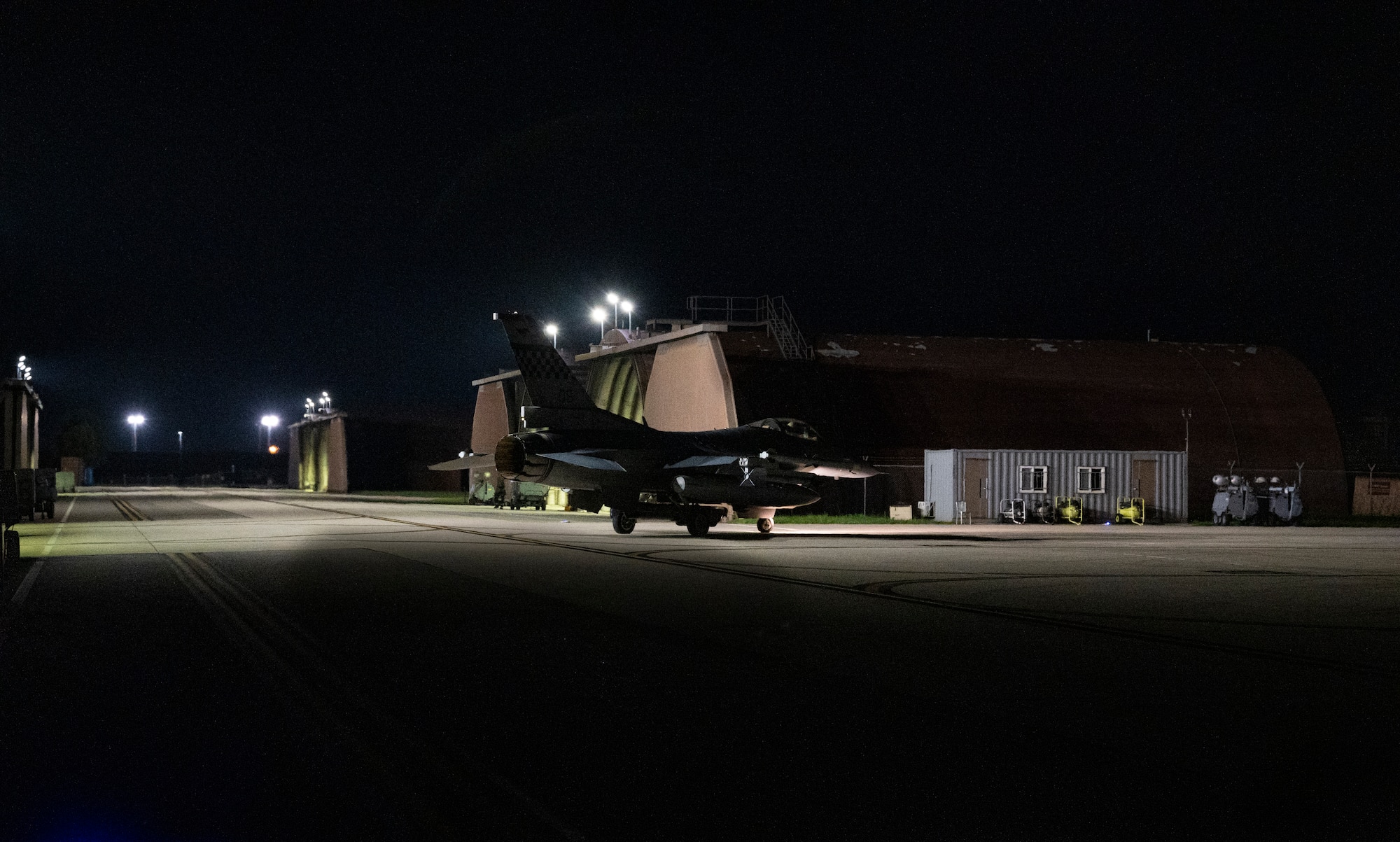 An F-16 Fighting Falcon assigned to the 36th Fighter Squadron taxis to the runway prior to flying a night sortie at Osan Air Base, Republic of Korea, Sept. 13, 2022.
