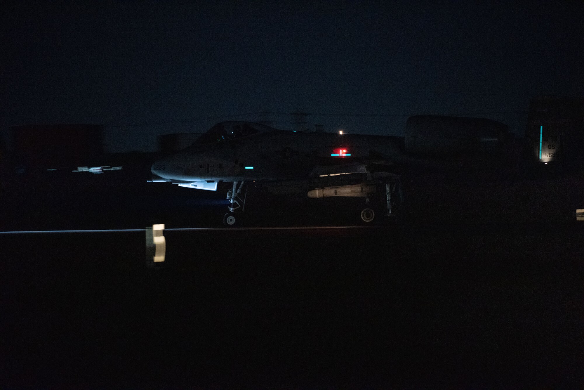 An A-10 Thunderbolt II from the 25th Fighter Squadron taxis on a runway after flying a night sortie for a wing training event at Osan Air Base, Republic of Korea, Sept. 14, 2022.