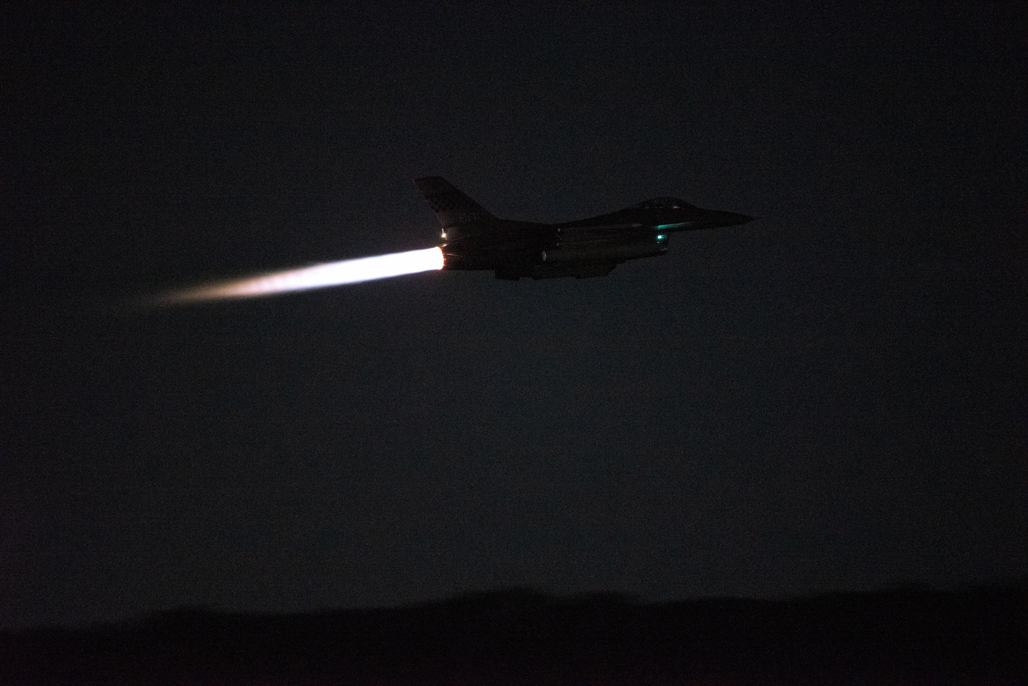 An F-16 Fighting Falcon from the 36th Fighter Squadron takes off for a night sortie during a training event at Osan Air Base, Republic of Korea, Sept. 14, 2022.