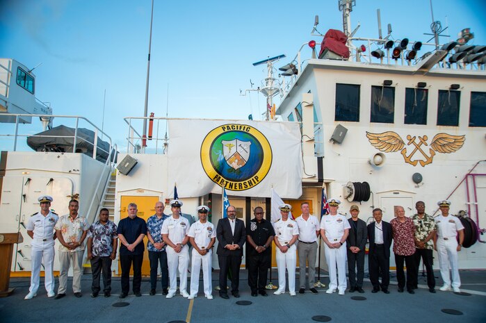 HONIARA, Solomon Islands (Sep. 10, 2022) – Pacific Partnership 2022 (PP22) leadership, Solomon Island leaders, and members of the international diplomatic corps in the Solomon Islands pose for a photo during the PP22 Solomon Islands closing ceremony aboard Military Sealift Command hospital ship USNS Mercy (T-AH 19). Now in its 17th year, Pacific Partnership is the largest annual multinational humanitarian assistance and disaster relief preparedness mission conducted in the Indo-Pacific. Pacific Partnership is a unifying mission that fosters enduring friendships and cooperation among many nations. The year’s mission in Solomon Islands included participants from the United States, Japan and Australia. (U.S. Navy photo by Mass Communication Specialist 2nd Class Jacob Woitzel)