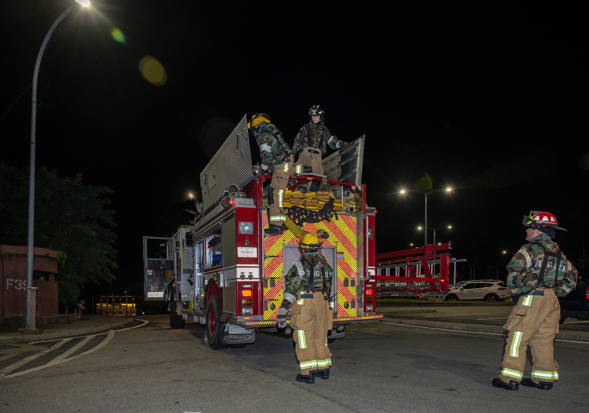 U.S. Air Force Firefighters assigned to the 51st Civil Engineer Squadron, pack up a fire truck after a fire response training scenario at Osan Air Base, Republic of Korea, Sept. 14, 2022.