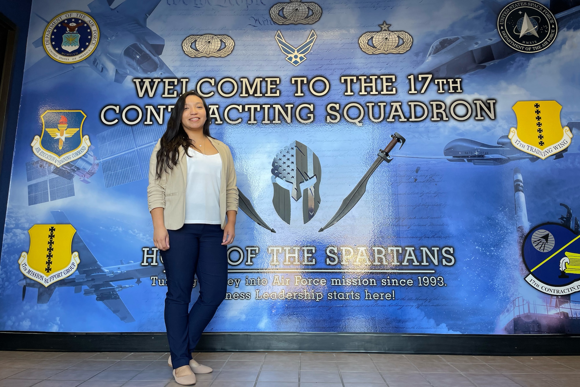 DeAngel Casarez, 17th Contracting Squadron contracting officer, represents her squadron, at Goodfellow Air Force Base, Texas, September 14, 2022. Cazarez is Mexican American and volunteered to represent her culture during the 17th Training Wing’s observance of National Hispanic Heritage Month. (U.S. Air Force photo by Senior Airman Abbey Rieves)