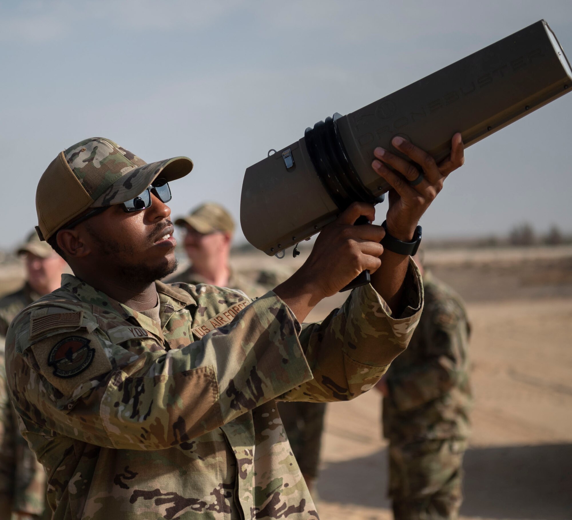 332d Expeditionary Security Forces Squadron train on counter drone tactics against small Unmanned Aerial Systems (sUAS) at an undisclosed location in Southwest Asia, September 6, 2022.  sUAS are extremely difficult to detect or classify, and are used by adversaries to gather intelligence or to conduct electronic attacks and drone strikes. ESFS Airmen train on how to spot suspicious aircraft and to use the Dronebuster to block radio signals, to potentially ground these aircraft. (U.S. Air Force photo by Tech. Sgt. Jeffery Foster)