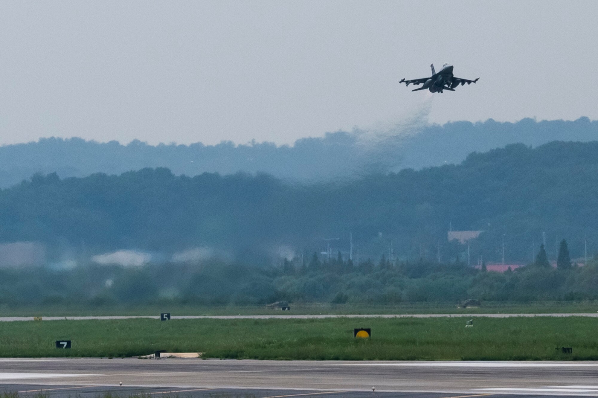 An F-16 Fighting Falcon assigned to the 36th Fighter Squadron takes off from Osan Air Base, Republic of Korea, Sept. 13, 2022, prior to a simulated mortar attack during a training scenario.