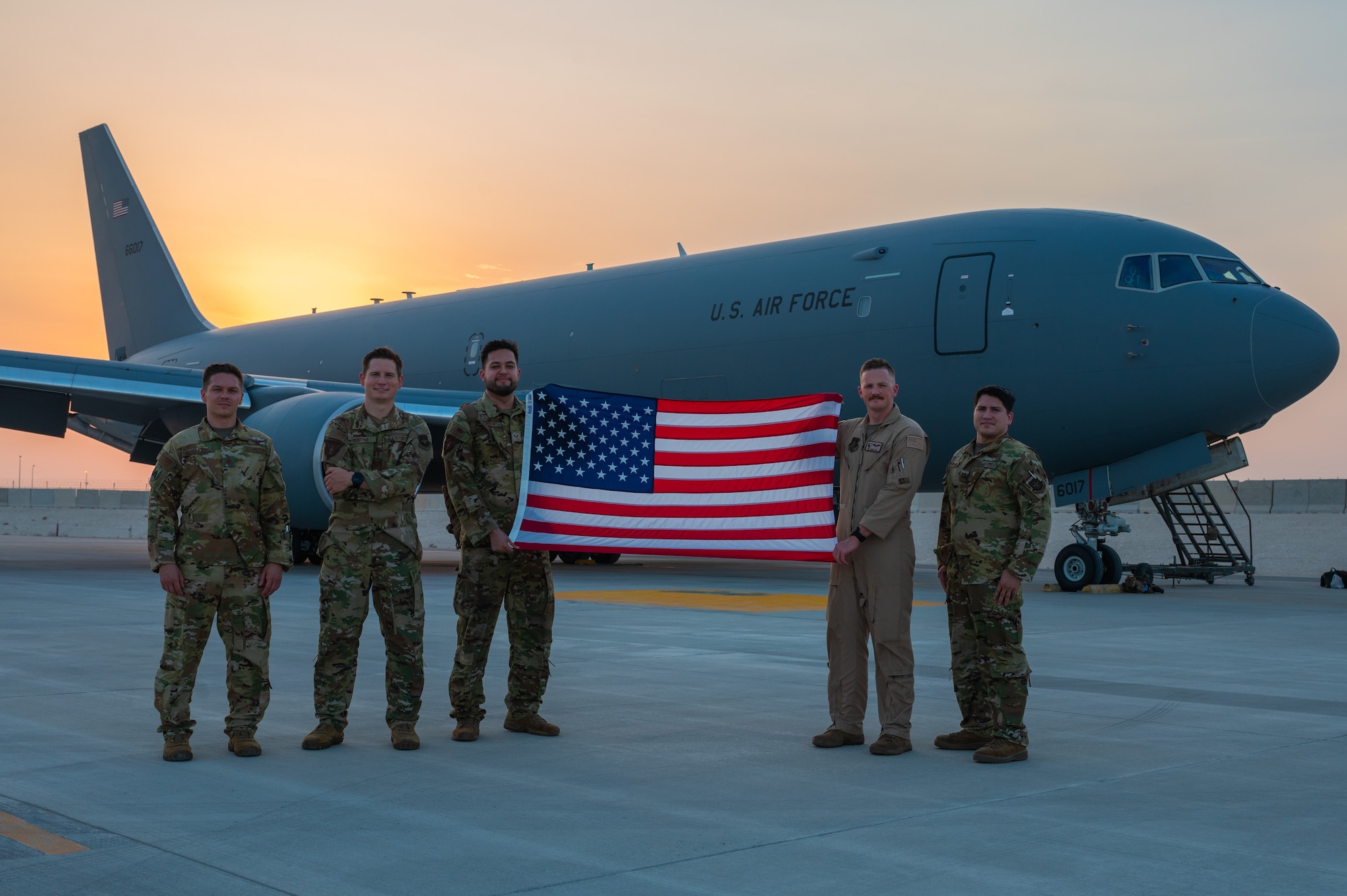 The aircrew from the KC-46A Pegasus’ first combat sortie pose for a group photo Aug. 29, 2022, during Air Mobility Command’s Employment Concept Exercise 22-08 at Al Udeid Air Base, Qatar.