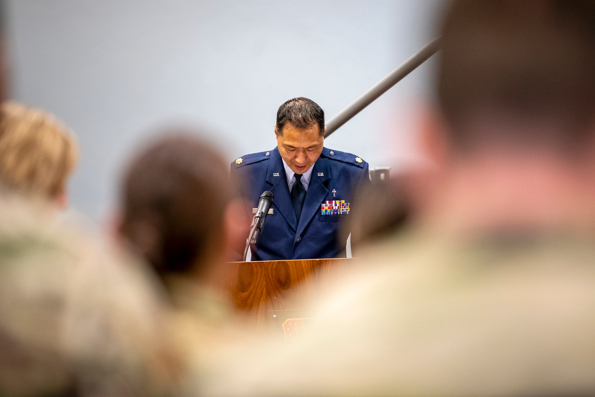 U.S. Air Force Maj. Myung Cho, 501st Combat Support Wing deputy wing chaplain, speaks during a 9/11 retreat ceremony at RAF Croughton, England, Sep 9, 2022. Airmen and guests participated in the ceremony to honor those who lost their lives during the September 11th terrorist attacks. (U.S. Air Force photo by Staff Sgt. Eugene Oliver)