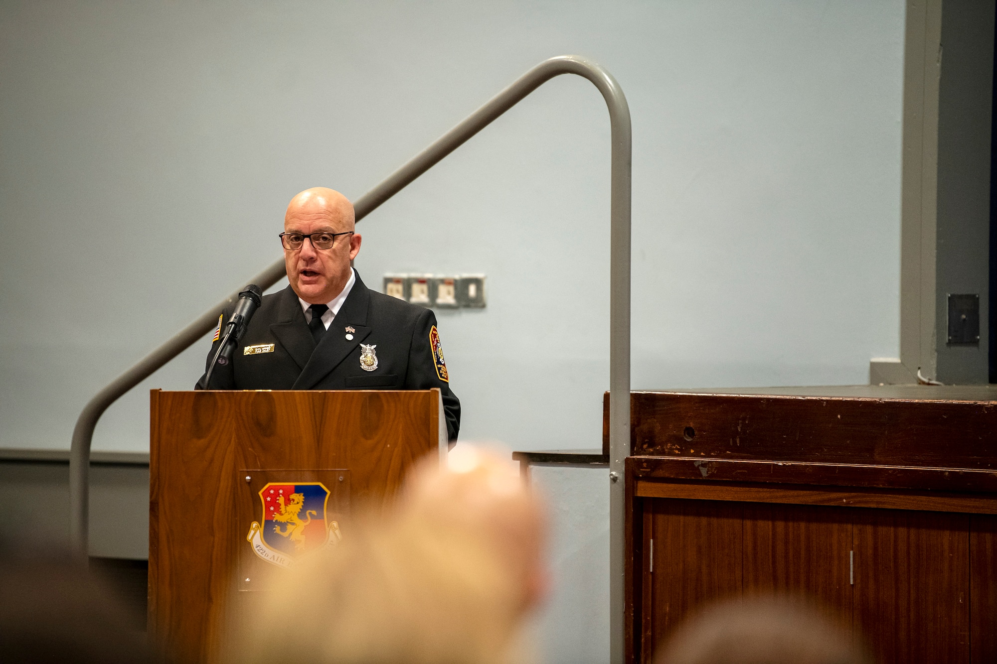 Keith Jimmo, 422d Civil Engineer Squadron fire chief, speaks during a 9/11 retreat ceremony at RAF Croughton, England, Sep. 9, 2022. Airmen and guests participated in the ceremony to honor those who lost their lives during the September 11th terrorist attacks. (U.S. Air Force photo by Staff Sgt. Eugene Oliver)