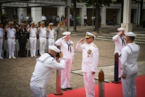 Vice Adm. Thomas Ishee, commander, U.S. Sixth Fleet, salutes during a change of command ceremony held on Naval Support Activity Naples, Italy, after relieving Vice Adm. Gene Black, Sept. 15, 2022.