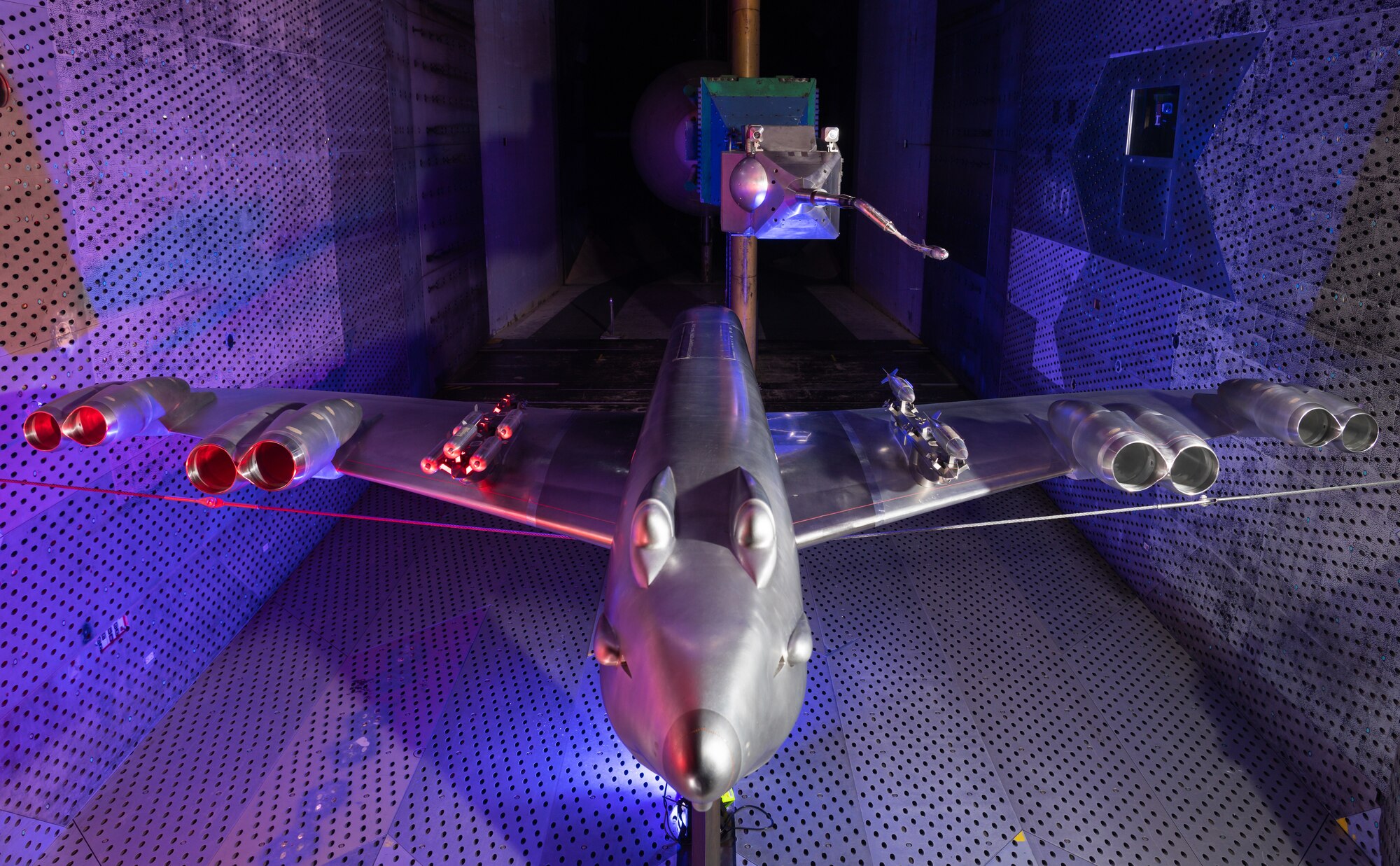 B-52 model with captive bombs on both wings and one bomb on sting above wing.