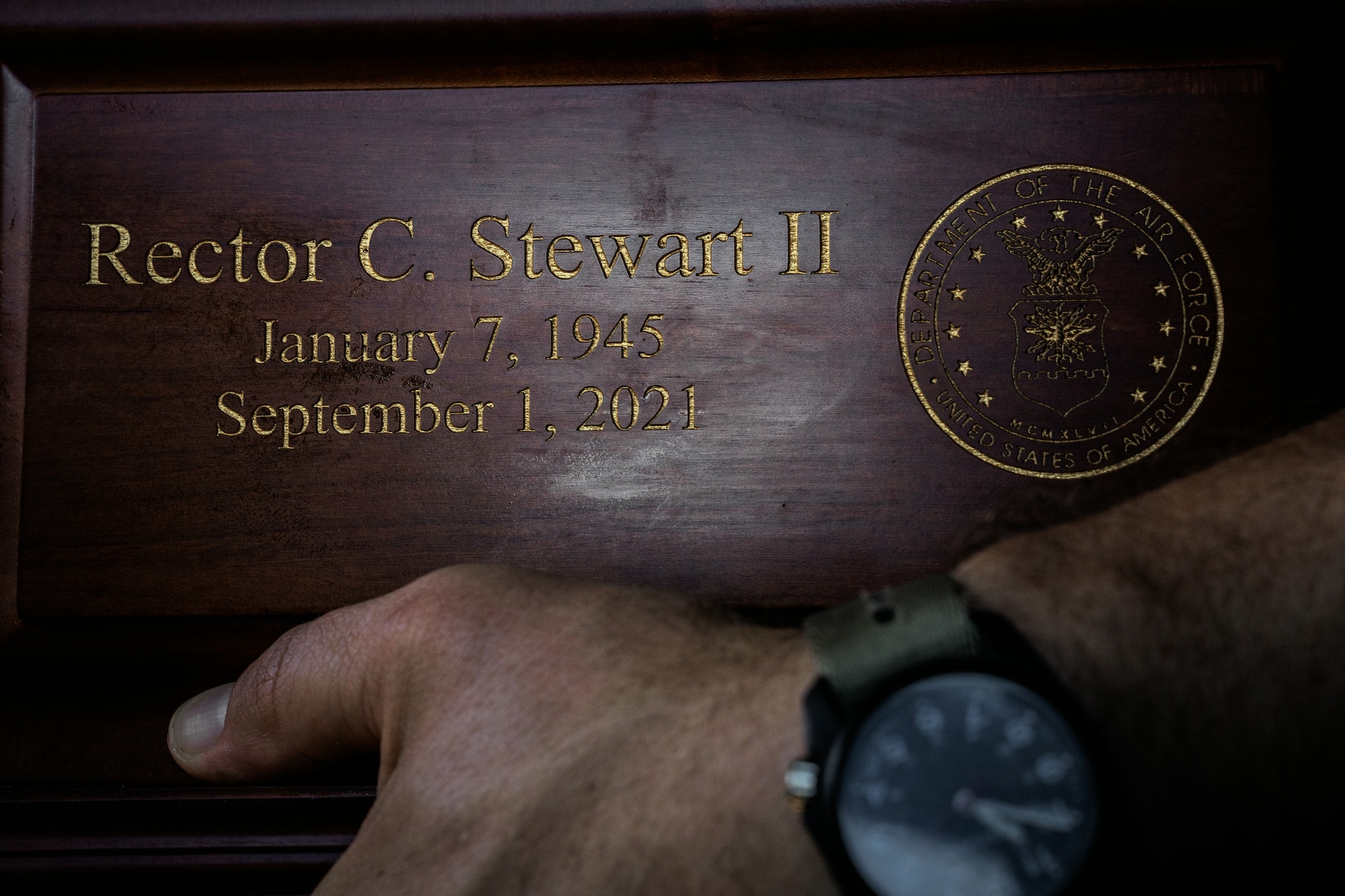 U.S. Marine Corps Capt. Jason Stewart, U.S. Marine Corps Forces, Central Command G-6 operations officer, carries his father’s ashes on an HC-130J Combat King II aircraft assigned to the 920th Rescue Wing, Patrick Space Force Base, Florida, over Tampa, Florida, Sept. 1, 2022.