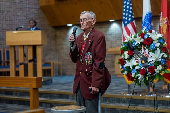 Retired U.S. Army Master Sgt. Ed Beck, World War two veteran and Former prisoner of war, speaks during the Space Base Delta 1 POW/MIA remembrance ceremony at Peterson Space Force Base, Colorado, Sept. 13, 2022.  In 1944, During the Battle of the Bulge, Beck was a Browning Automatic rifle gunner in the 106th Infantry Division, 422nd Regiment. One night, Beck’s group found themselves surrounded by German soldiers near the city of Prum, Germany. After a short, small-arms battle, the division was forced to surrender and were taken as prisoners. Beck and 19 other Americans were sent to a prison camp near Oschatz, Germany, a trip that took nearly five days both on foot and by train to reach. After spending nearly six months as a prisoner of war, Beck eventually escaped the camp and found his way back to U.S. control. He then made his way home and served in the Korean War several years later. (U.S. Space Force photo by Airman 1st Class Aaron Edwards)